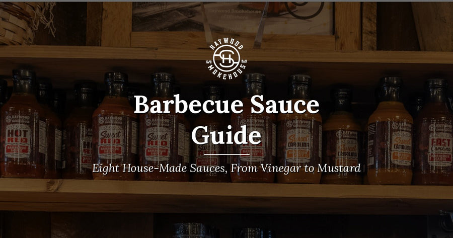 Haywood Smokehouse house-made barbecue sauces in full-size bottles: Hot Red, Sweet Red, Sweet Carolina, and East Carolina.
